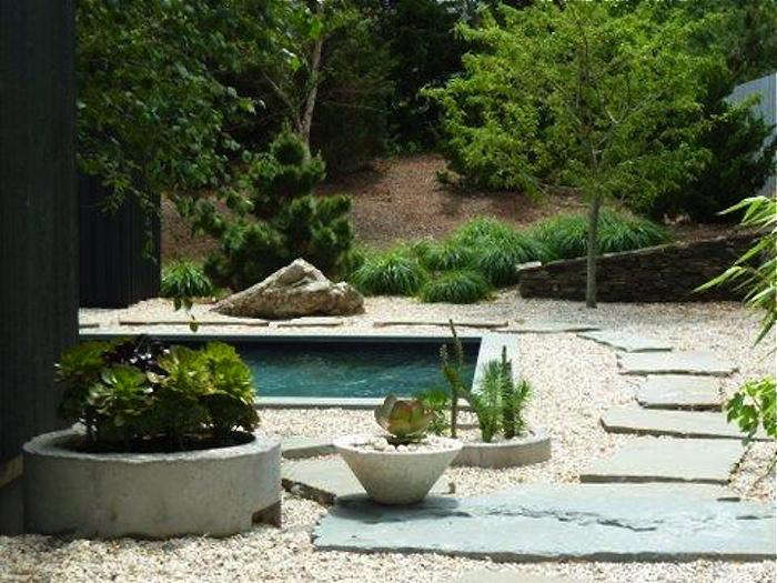 Natural cleft fieldstone set in gravel at the Shelter Island home of designers Jonathan Adler and Simon Doonan. Photograph by Vickie Cardaro.